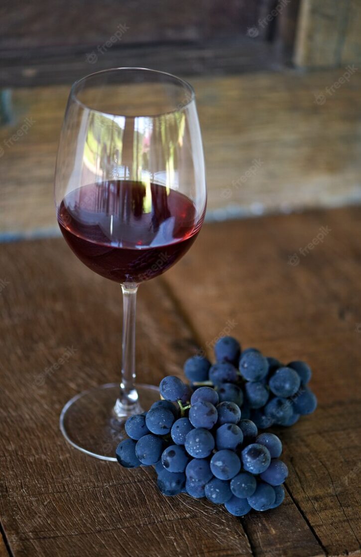 glass-of-red-wine-and-grape-bunch_74436-1059